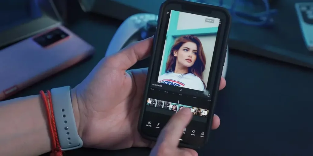 A person hand on a mobile screen using Capcut for video editing